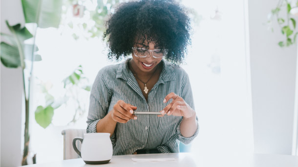 Female employee taking advantage of Trustmark claim-free return to receive cash back 